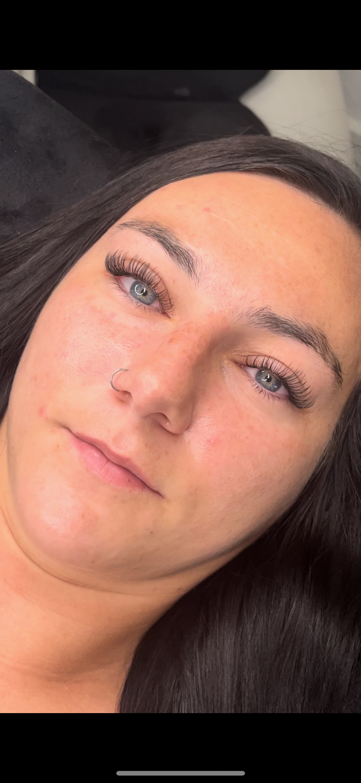 Close-up of lash extension work